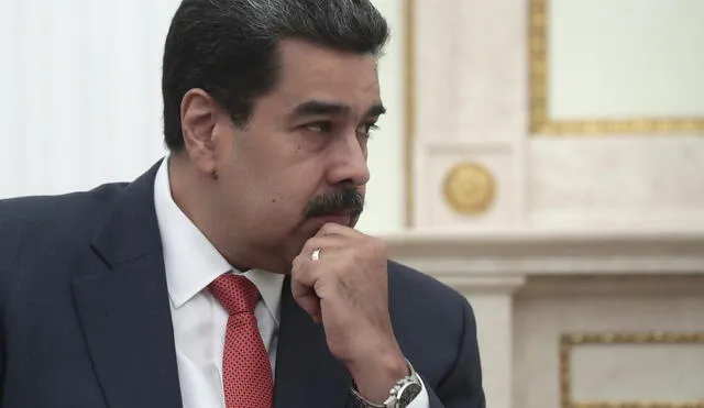 Venezuelan President Nicolas Maduro listens to Russian President during their meeting at the Kremlin in Moscow on September 25, 2019. - Welcoming the leftist leader at the Kremlin, Putin reiterated support for Maduro's regime but also indicated the Venezuelan president should be open to dialogue with his critics. (Photo by Sergei CHIRIKOV / POOL / AFP)