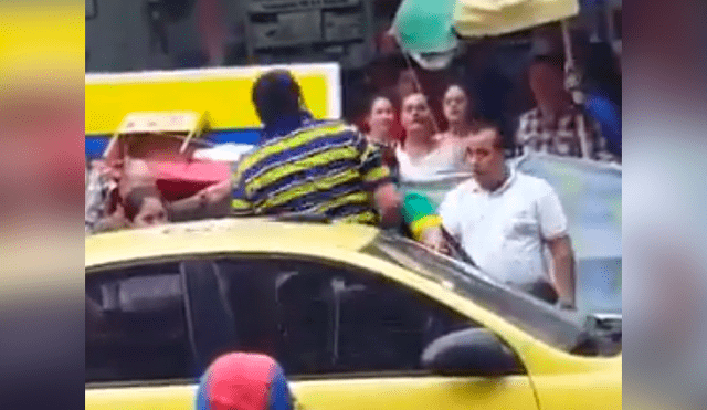 Facebook viral: furioso hombre quiso pegarle a taxista, pero huye temeroso al ver su tamaño [VIDEO]