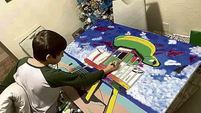 talento. Matthew, en pleno proceso de creación. Desde los dos años, ha elaborado cerca de 500 pinturas que abarrotan su casa en Miami.