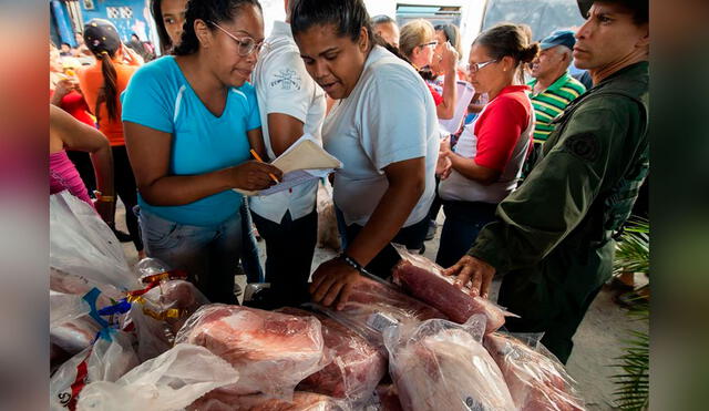La pierna de cerdo es conocida en Venezuela como “pernil” y forma parte del tradicional plato navideño. Foto: spanish.xinhuanet.com