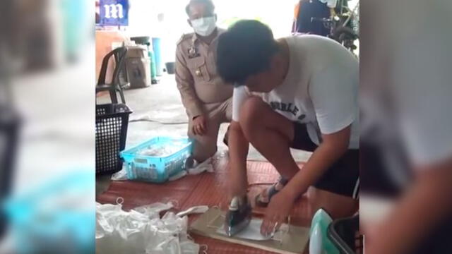 Capturan a trabajadores que lavaban y planchaban mascarillas para revenderlas contra el coronavirus [VIDEO]