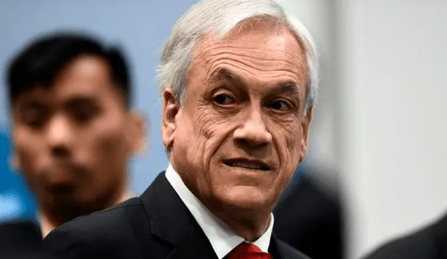 "La inmensa mayoría de los chilenos queremos vivir en democracia y en paz", afirmó Piñera. Foto: AFP
