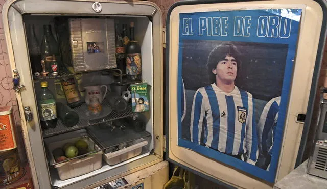 Memorabilia objects are displayed at the 'Casa de Dios' (House of God) museum in Buenos Aires, on June 27, 2018. - 'Casa de Dios' is located at the house where Argentine football star Diego Maradona used to live (1978 - 1980) when he played for Argentinos Juniors in La Paternal neighborhood. (Photo by EITAN ABRAMOVICH / AFP)