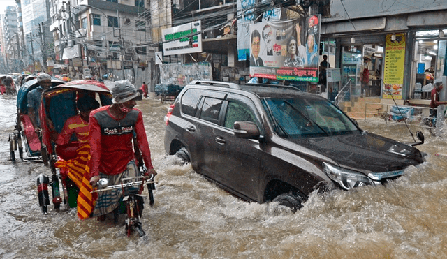 Los científicos pronostican que las inundaciones empeorarán a medida que el cambio climático intensifique las lluvias. Foto: Munir Uz Zaman / AFP