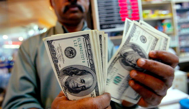 En el mercado paralelo, el dólar se compra a 3,61 soles y se vende a 3,64 soles. Foto: AFP