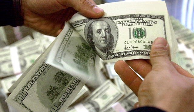 Conozca el tipo de cambio para el dólar en Perú este viernes 24 de marzo. Foto: AFP
