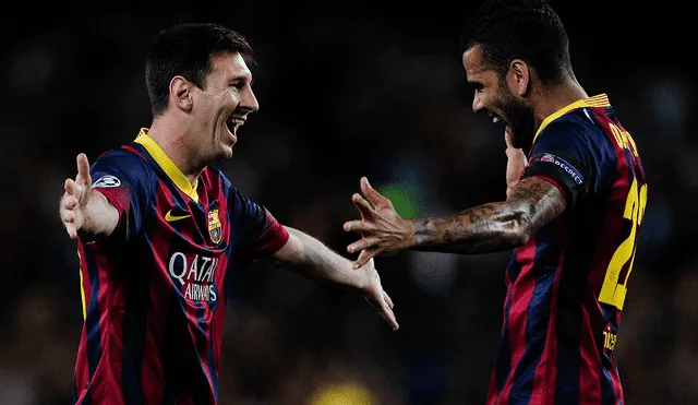 Lionel Messi y Dani Alves coincidieron en ocho temporadas con el FC Barcelona. Foto: AFP