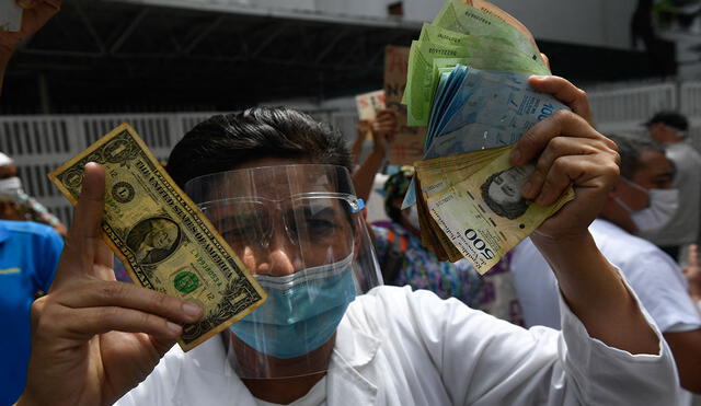 El dólar BCV sirve como referencia para gran cantidad de personas en Venezuela. Foto: AFP