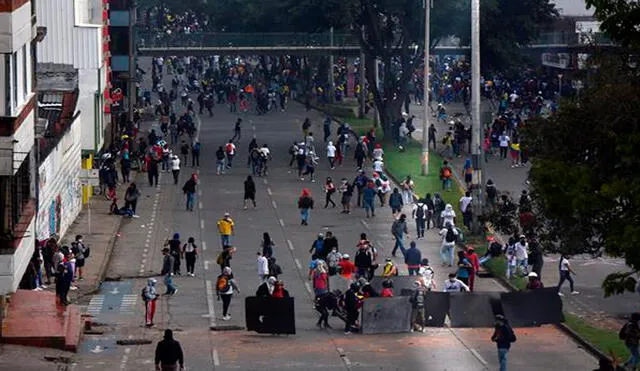 Manifestantes participan en la tercera jornada de protestas en contra de la reforma tributaria propuesta por el Gobierno de Iván Duque. Foto: EFE