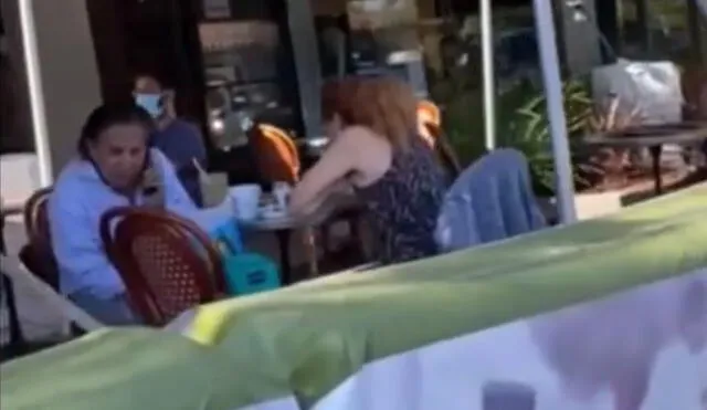 El breve video muestra a Toledo hablando por teléfono mientras la ex primera dama ingiere los alimentos de espaldas a la cámara. Foto: captura de Latina