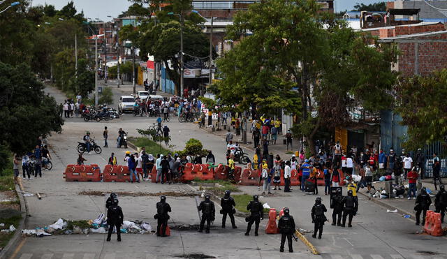 Colombia registra fuertes enfrentamientos desde el pasado 28 de abril en respuesta a las reformas tributarias que buscaba implementar el Gobierno de Duque. Foto: AFP