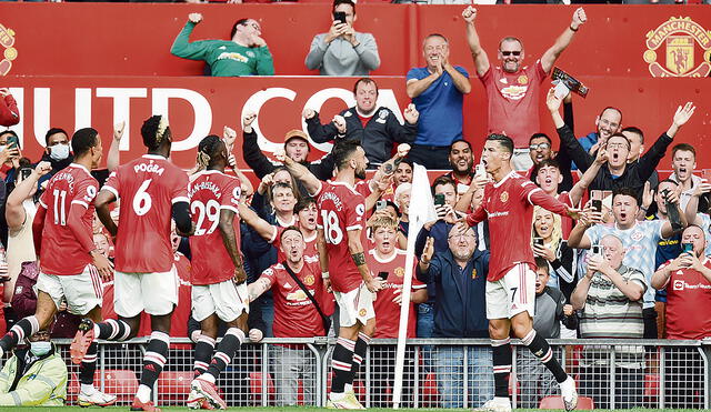 Júbilo. Los hinchas del United celebraron junto a ‘CR7’ sus goles. Foto: difusión