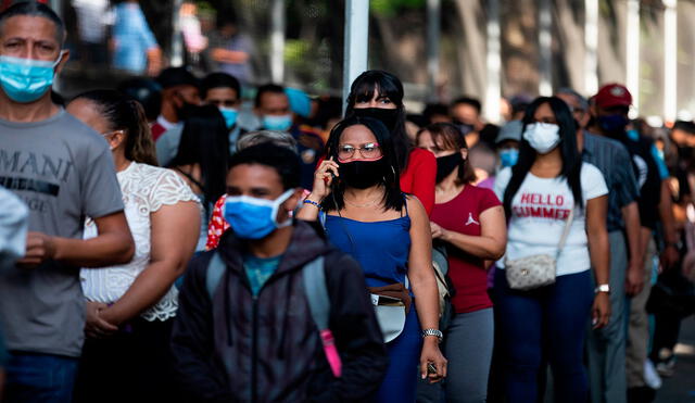 Bono Digamos Presente surge en medio de la severa crisis económica en Venezuela y las críticas del régimen de Maduro al FMI. Foto: EFE