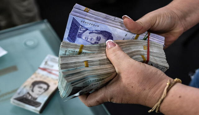 Precio dólar BCV, tasa que fija de manera oficial el mercado y que sirve como referencia para diversas transacciones realizadas también en bolívares. Foto: AFP