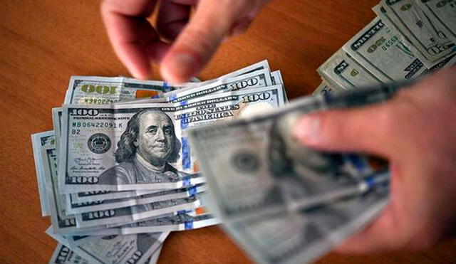 El dólar blue es un dólar paralelo que se obtiene en el mercado negro. También es conocido como dólar paralelo o dólar negro. Foto: AFP