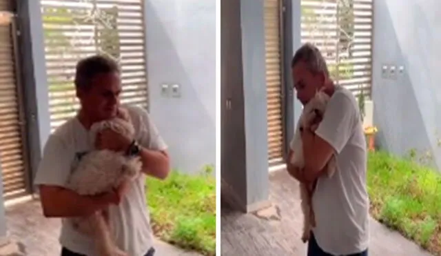 Un hombre abrazó a su adorable mascota para calmarla, debido a que sus familiares cometieron un error y no le abrieron la puerta de su casa. Foto: captura de Facebook