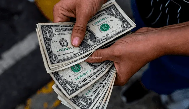 El precio del dólar BCV es la tasa oficial autorizada por el régimen de Nicolás Maduro para contrarrestar el mercado paralelo. Foto: AFP
