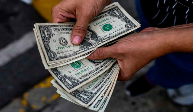 El precio del dólar BCV es la tasa oficial autorizada por el régimen de Nicolás Maduro para contrarrestar el mercado paralelo. Foto: AFP