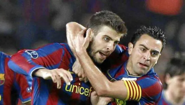 Xavi y Piqué fueron compañeros en el Barcelona entre el 2008 y 2015. Foto: AFP