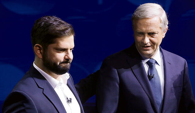 Futuro presidente. Gabriel Boric (izquierda) y José Antonio Kast en el reciente debate. Foto: EFE