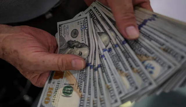 En la tarde de HOY, lunes 20 de diciembre, se actualizará en Venezuela el precio del dólar BCV. Foto: AFP