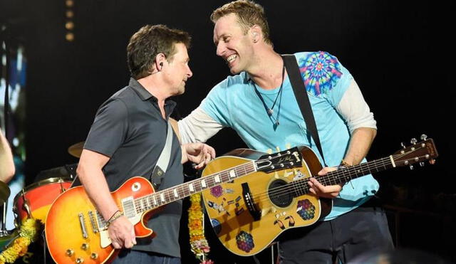 Chris Martin y Michael J. Fox juntos en un concierto de Coldplay en Nueva York. Foto: difusión