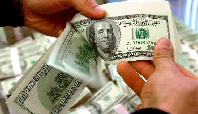 El dólar BCV es ampliamente revisado en Venezuela para diversas transacciones. Foto: AFP