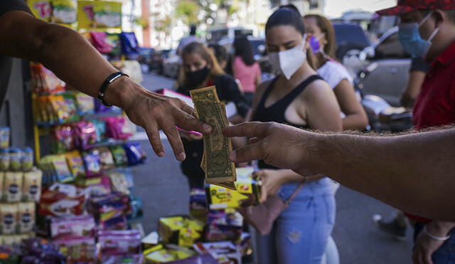 Precio del dólar en Venezuela hoy, miércoles 19 de enero, según DolarToday y Dólar Monitor. Foto. AFP