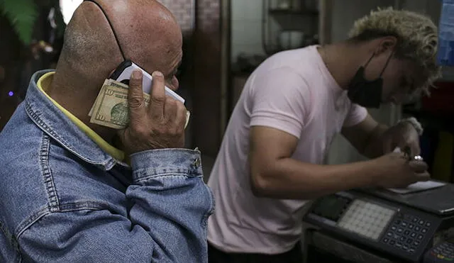 Conoce el precio del dólar en Venezuela hoy, según Dólar Monitor y DolarToday. Foto: AFP