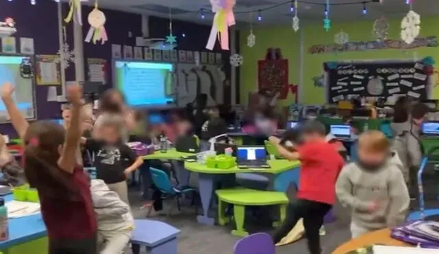 Pequeños estudiantes celebran el fin del uso de mascarillas en la escuela. Foto: captura de YouTube.