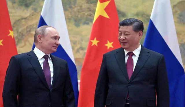 El presidente ruso, Vladimir Putin (izquierda), y el presidente chino, Xi Jinping, se reunieron en Beijing el 4 de febrero de 2022. Foto: AFP
