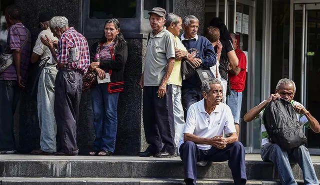 Inicia pago de la pensiones del Seguro Social IVSS este lunes, 21 de marzo de 2022, en Venezuela. Foto: AFP