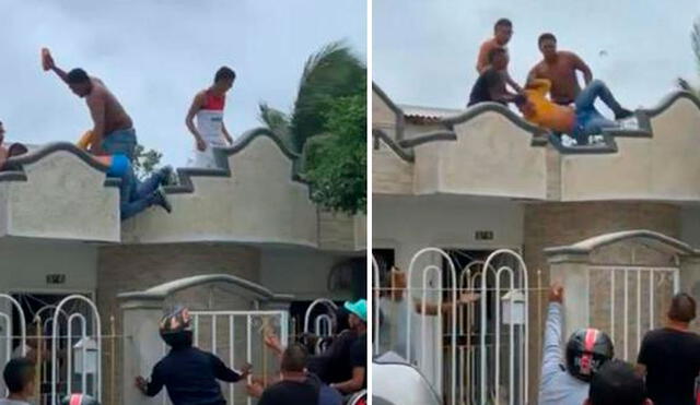 El sospechoso fue detenido por varios hombres en la azotea de una casa ubicada en el barrio Me Quejo, en Barranquilla. Luego lo golpearon y lanzaron antes de entregarlo a la policía. Foto: captura - El Tiempo