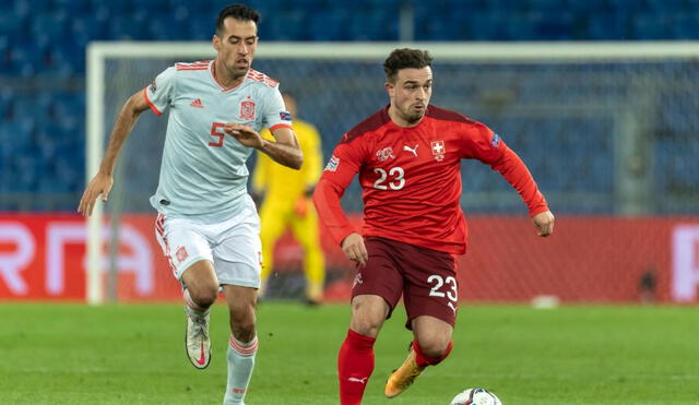 Busquets y Shaquiri se volverán a ver las caras. Foto: EFE