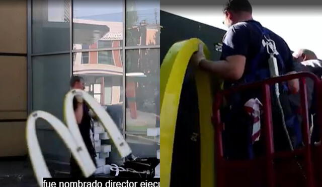 Trabajadores retiran todo lo relacionado a McDonald's en uno de los restaurantes ubicados en Moscú. Foto: captura video/New York Post