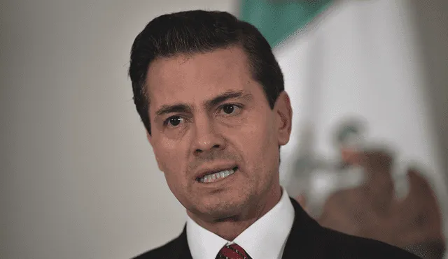 El expresidente de México, Enrique Peña Nieto, durante una conferencia de prensa al margen de la APEC. Foto: AFP