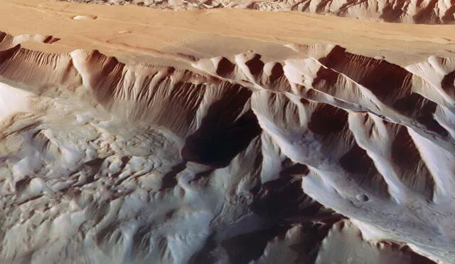 Valles Marineris es el sistema de cañones más grande de Marte y del sistema solar. En la imagen se observa una de sus grietas visto en perspectiva: Tithonium Chasma. Foto: ESA / DLR / FU Berlin
