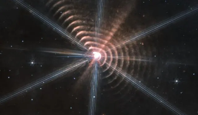 El fenómeno captado por el James Webb corresponde al sistema estelar binario WR 140. Foto: JWST/Judy Schmidt