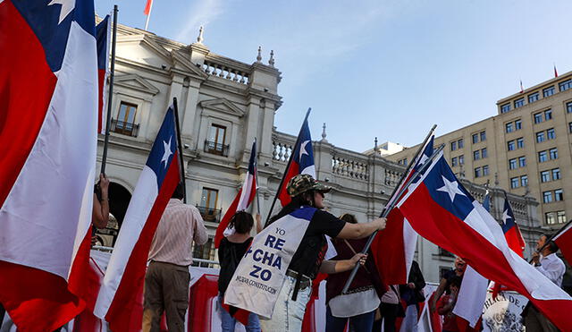 "Vamos avanzando a paso firme", dijo a la prensa el presidente de la Cámara de Diputados, Raúl Soto, sobre la reunión de los partidos. Foto: AFP/referencial