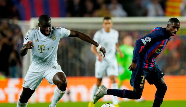 Dembele superando la marca de Upamecano durante el Barcelona vs. Bayern. Foto: EFE