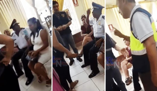 Un agente de Serenazgo intervino para sacar a la mujer. Foto: captura de Roque Noticias Pucallpa - Video: Roque Noticias Pucallpa