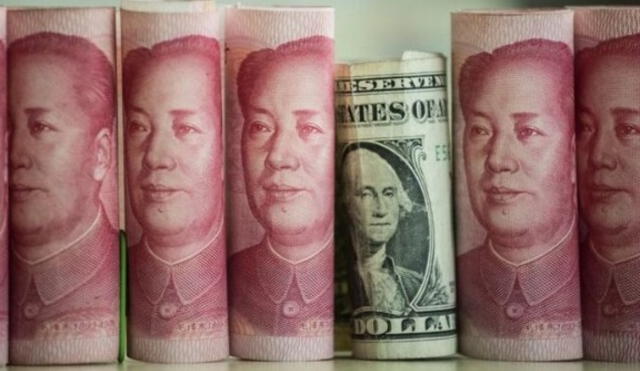 China en apuros. En lo que va de año, el yuan ha caído más de un 5% frente al dólar. Foto: AFP