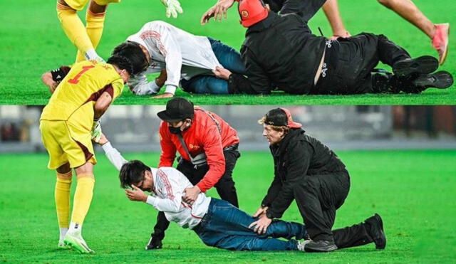 Pedro Gallese protagonizó un curioso momento con un hincha que ingresó al campo. Foto: Movistar Deportes