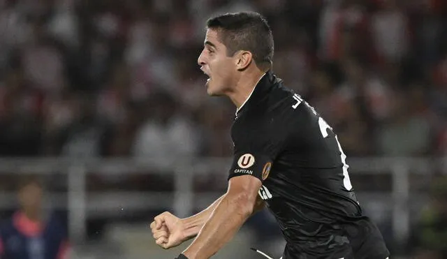 Aldo Corzo anotó el gol de Universitario ante Junior en Barranquilla. Foto: AFP