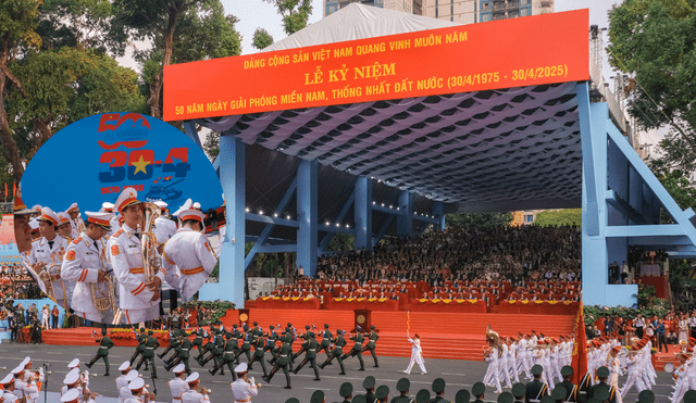 Thousands of Vietnamese march in celebration during the grand parade marking the 50th anniversary of the Vietnam War's end and the country's reunification in Ho Chi Minh City. Photo: GLR composition/ The New York Times Thousands of Vietnamese march in celebration during the grand parade marking the 50th anniversary of the Vietnam War's end and the country's reunification in Ho Chi Minh City. Photo: GLR composition/ The New York Times