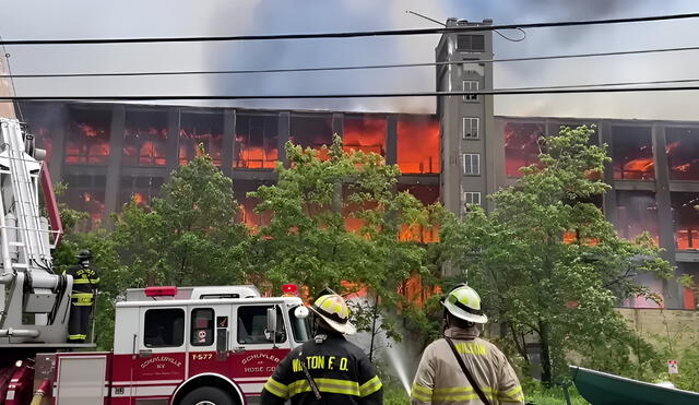 Firefighters battle the massive blaze that engulfed the 180-year-old Victory Mill in New York, allegedly set by a 14-year-old suspect. Photo: Tri-County Fire Videos Firefighters battle the massive blaze that engulfed the 180-year-old Victory Mill in New York, allegedly set by a 14-year-old suspect. Photo: Tri-County Fire Videos