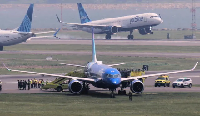 A JetBlue Airbus A220 rests on the grass after veering off the runway at Boston Logan Airport. No injuries were reported. Photo: Charles Krupa/ Pool A JetBlue Airbus A220 rests on the grass after veering off the runway at Boston Logan Airport. No injuries were reported. Photo: Charles Krupa/ Pool