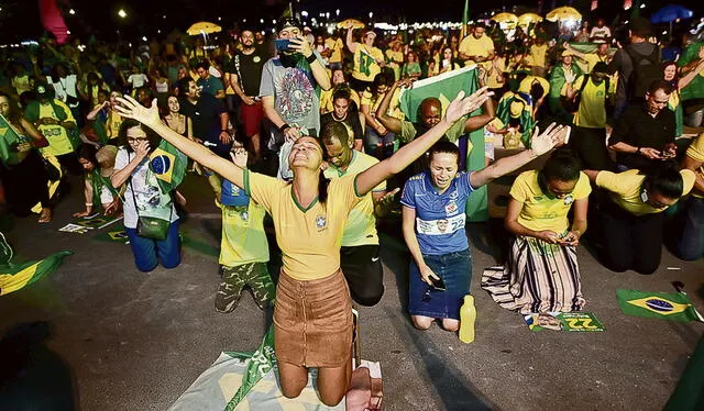 Imploran. Partidarios del presidente brasileño y candidato a la reelección Jair Bolsonaro. Foto: AFP
