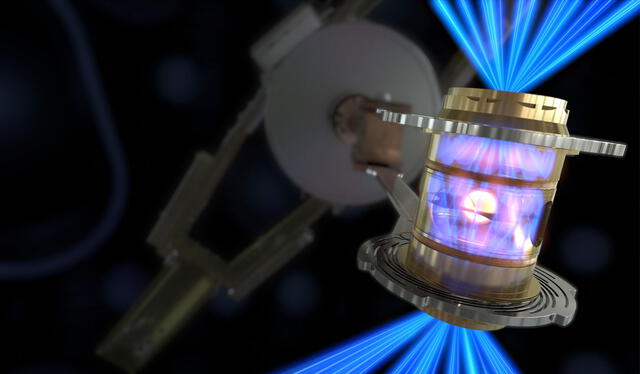 Representación artística del experimento: los láseres calientan el cilindro con la cápsula en el centro. Imagen: LLNL