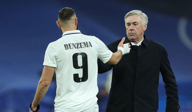 Benzema y Ancelotti. Foto: AFP   